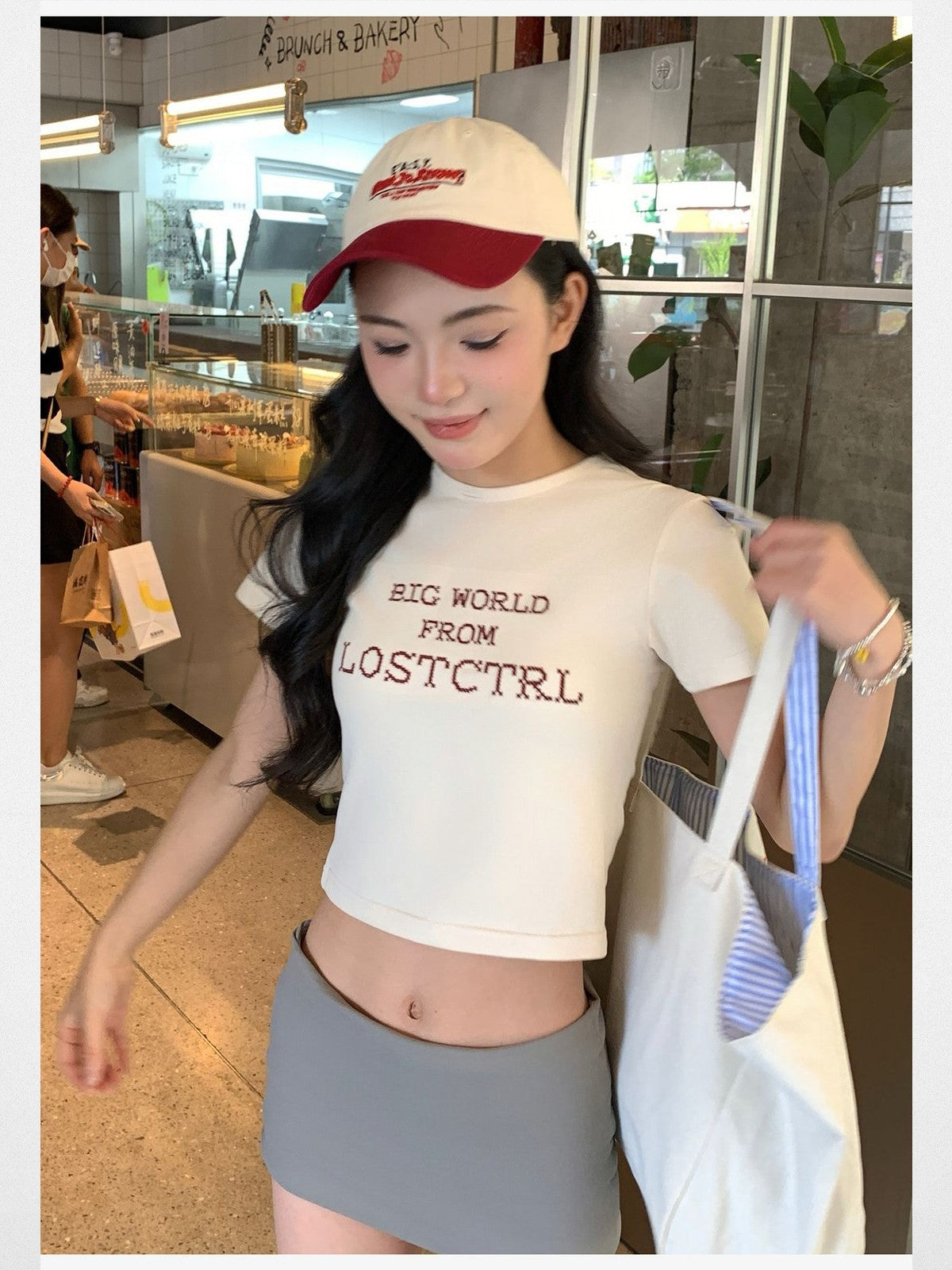 LOSTCTRL Cross Stitch Logo Cropped Tee in White - On Model