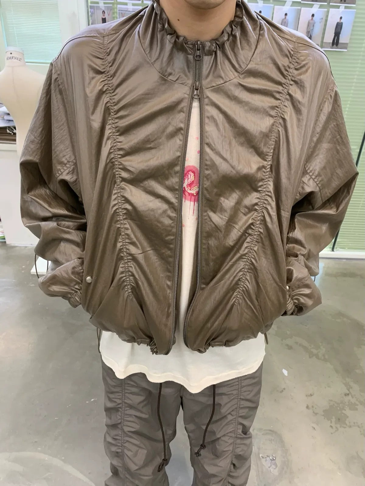 NeverSeez Glossy Ruched Tencel Windbreaker in Coffee - On Male Model