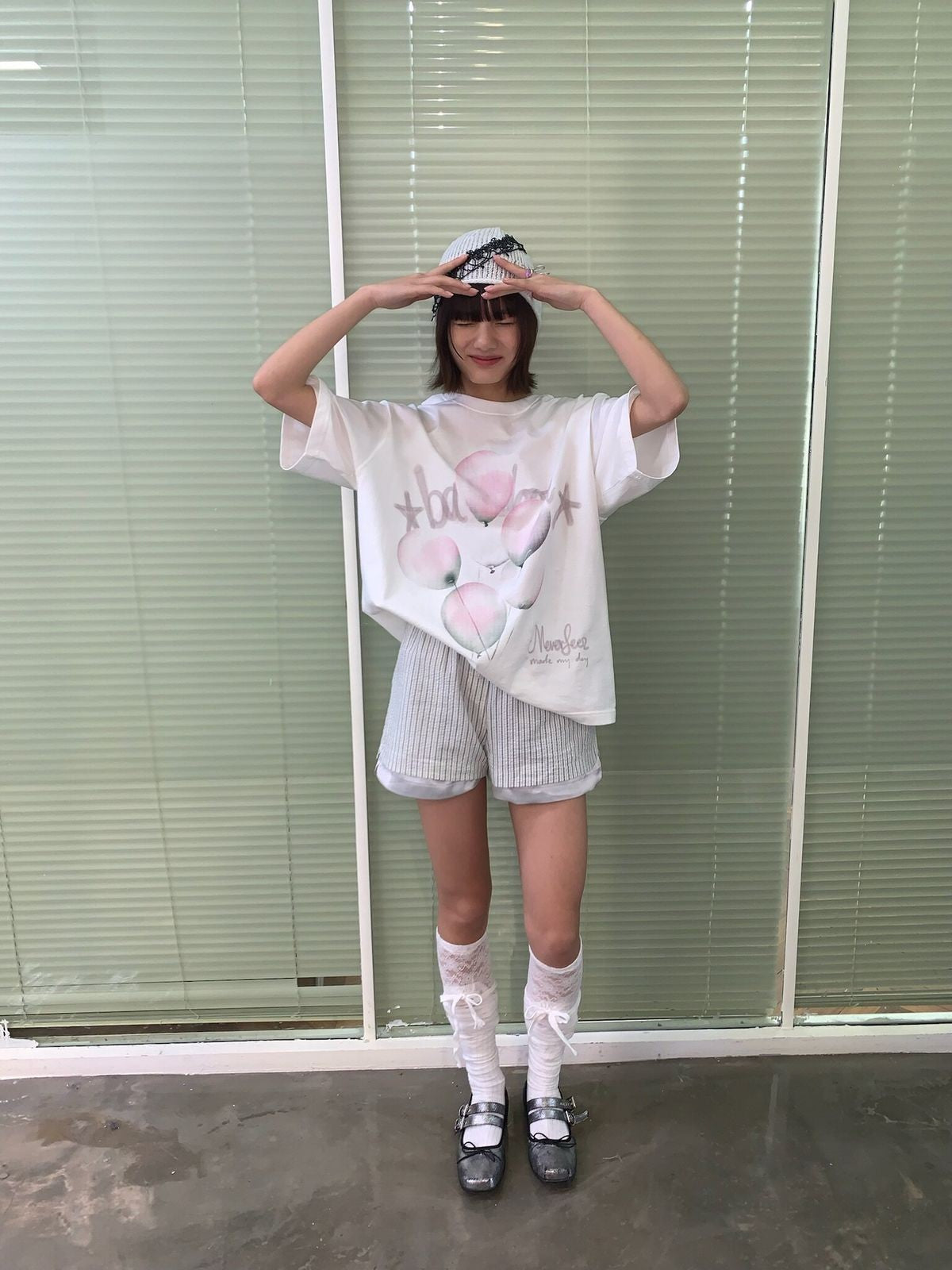 NeverSeez Retro Balloon Print Cotton T Shirt in White - On Female Model