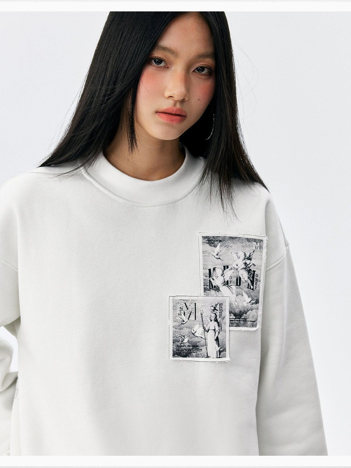 MEDM Angel Appliqu Fleece Sweatshirt in White - On Female Model