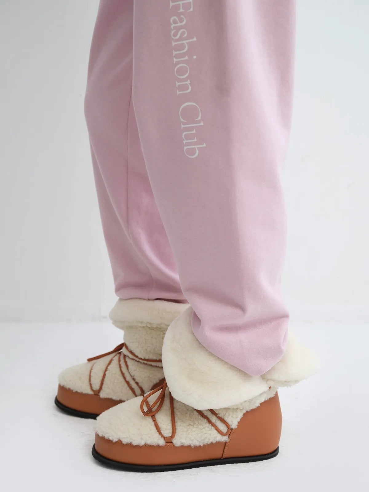 RARELY ALIKE Wool Lined Hidden Wedge Boots in Cream - On Model