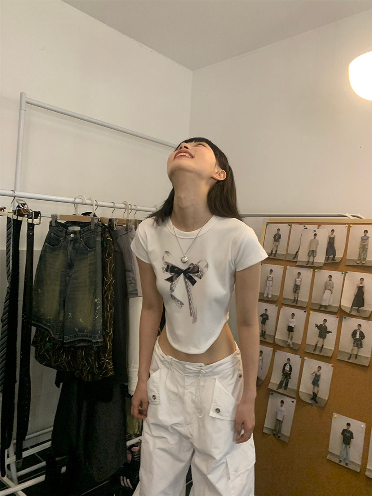 NeverSeez Lace Bow Graphic Baby Tee in White - On Model