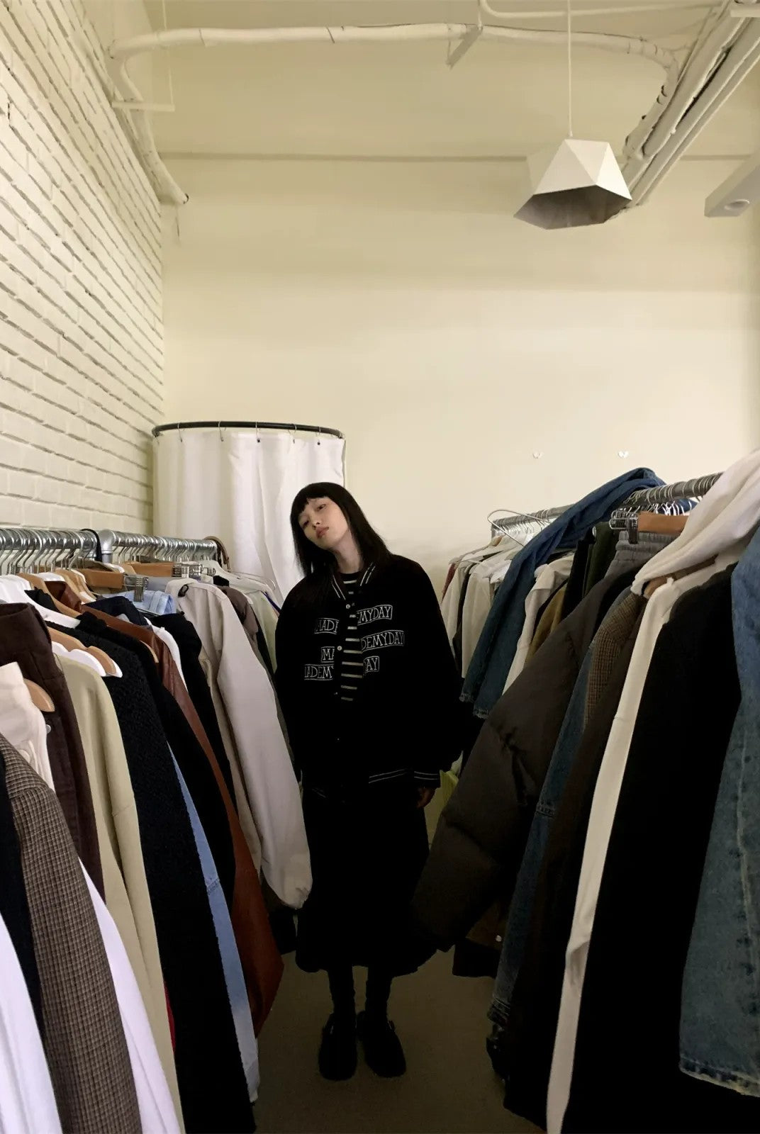 NeverSeez Velvet Corduroy Padded Varsity Jacket in Black - On Model