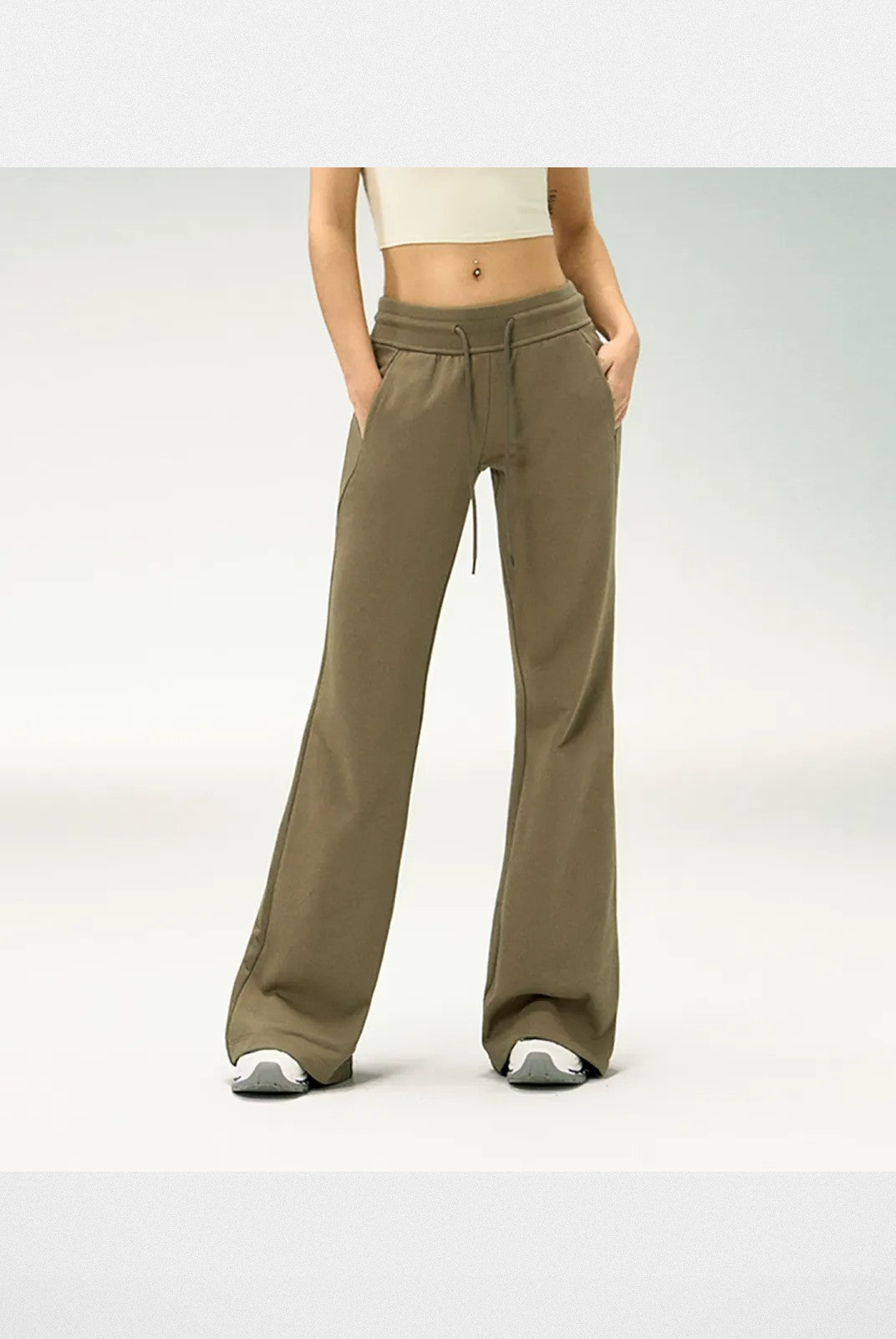 Ariseism Low Rise Micro Flare Sweatpants in Olive - On Model