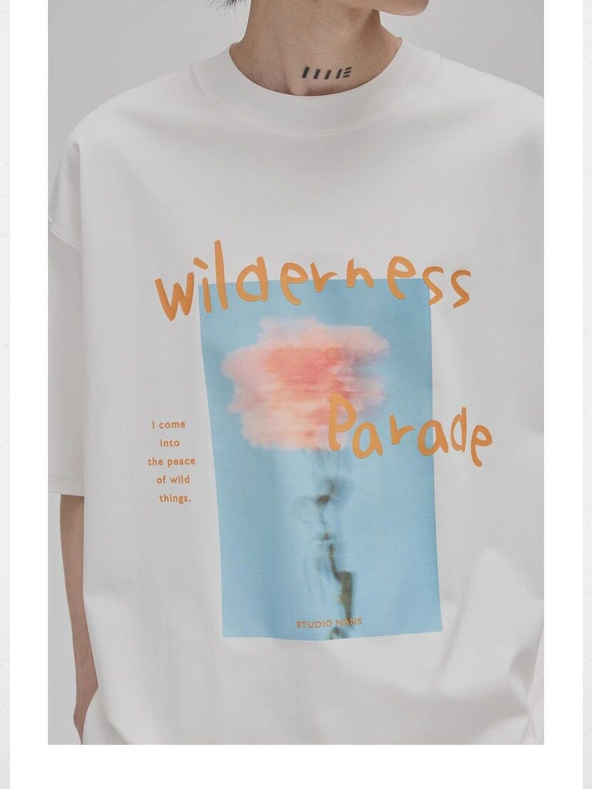NANS Wilderness Parade Mercerized Tee in Orange - On Model