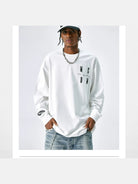 MEDM Embroidered Logo Long Sleeve Tee in White