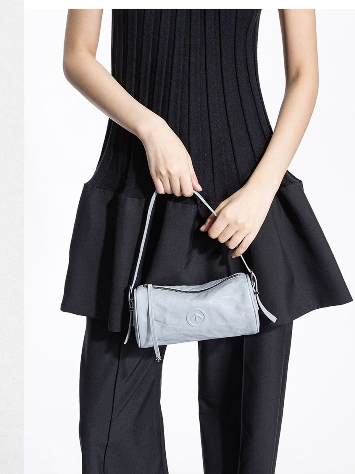 Grotto Pleated Leather Cylinder Bag in Sky Blue - On Female Model