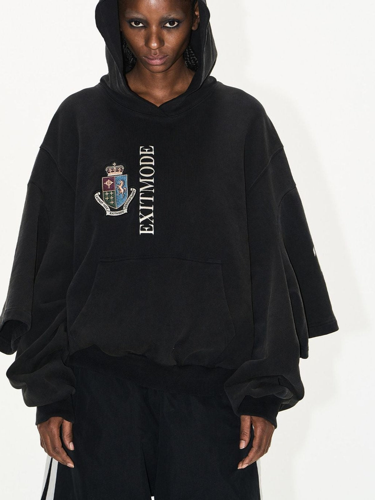 BLINDNOPLAN Washed Layered Sleeve Hoodie in Black - On Female Model