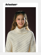 Ariseism Diagonal Cable High Neck Sweater in White - On Model