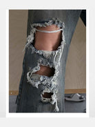 TRIANGLE PROJECT Distressed Dirty Wash Micro Flare Jeans in Denim - On Model