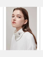 LOSTCTRL Embroidered Mock Neck Top in White - On Model