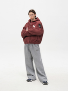 Distressed Horse Graphic Zip Hoodie in Burgundy - Male Model #color_burgundy