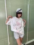 NeverSeez Retro Balloon Print Cotton T Shirt in White - On Female Model