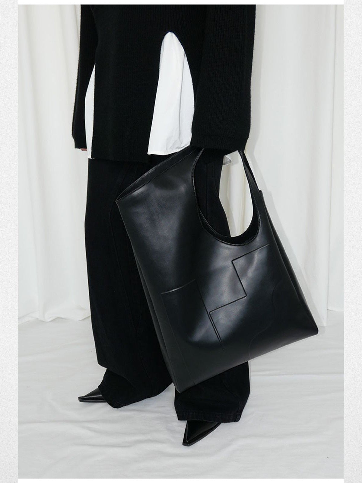 RARELY ALIKE Flared Cotton Denim Jeans in Black - On Model