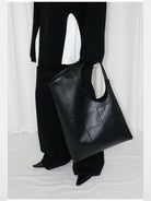 RARELY ALIKE Flared Cotton Denim Jeans in Black - On Model