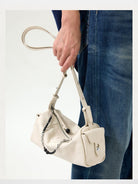 Songmont Leather Mini Camera Bag in Cream - On Model