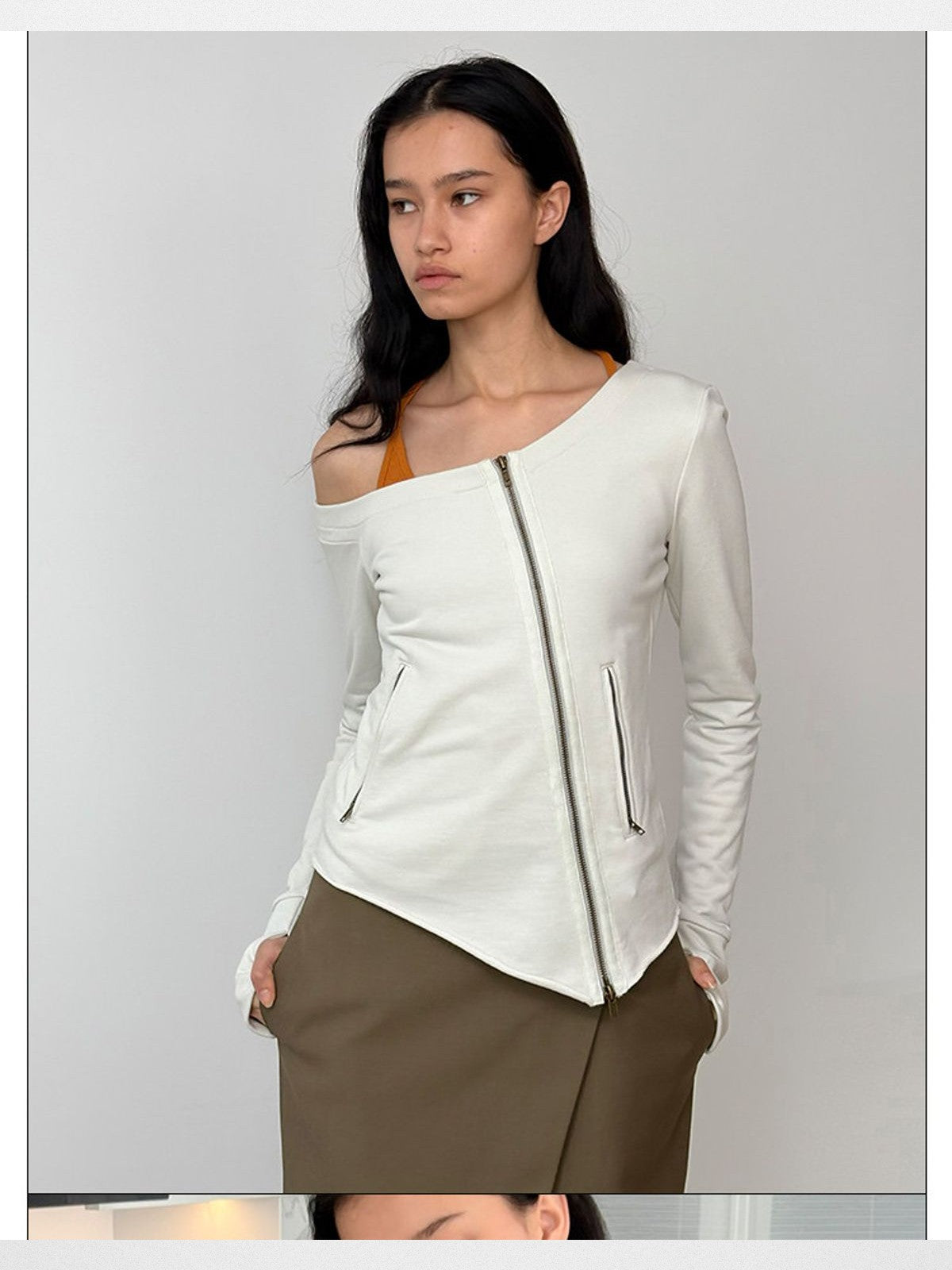 RARELY ALIKE Asymmetrical Zip Up Sweatshirt in White - On Model