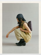 Songmont Mini Leather Bowling Bag in Brown - On Model