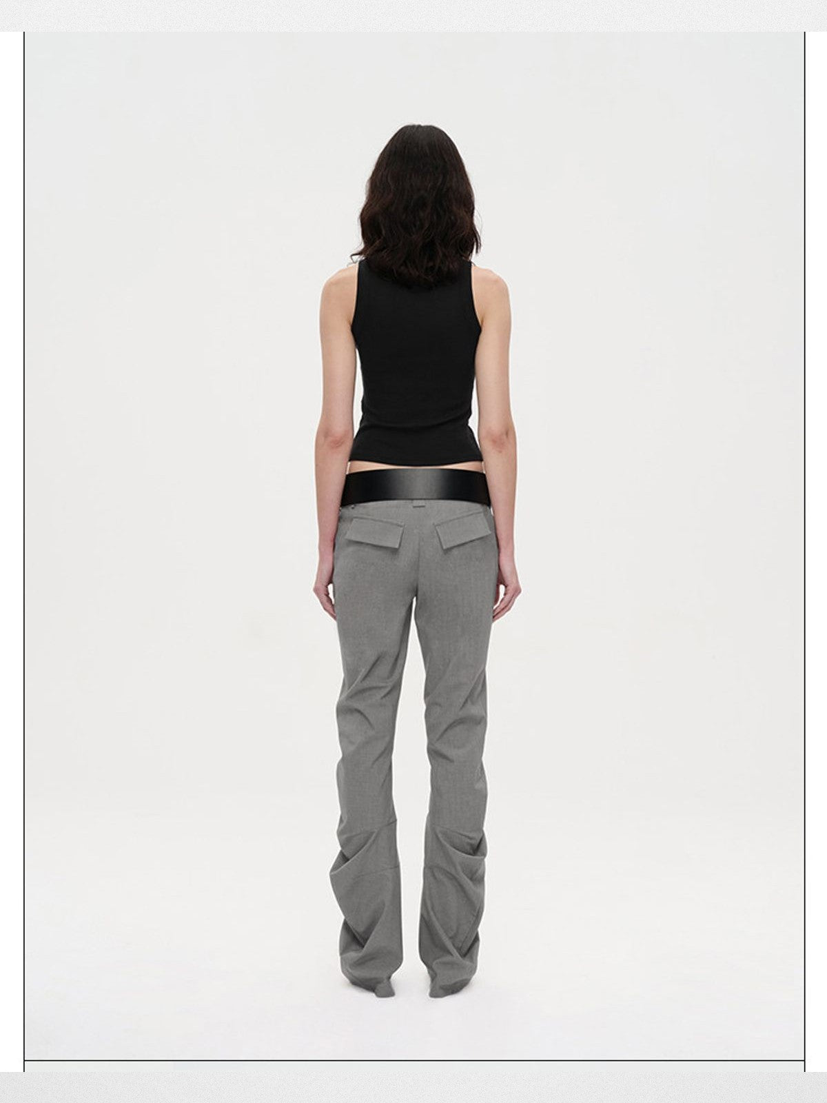 RARELY ALIKE Curved Leg Flared Suit Pants in Gray - On Model
