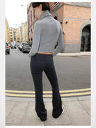 RARELY ALIKE Zip Up High Neck Wool Knit in Gray - On Model