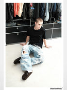 UNKNOWNWORLD Small Logo Cotton T Shirt in Black - On Model