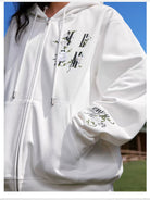MEDM Camellia Embroidered Zip Hoodie in White - On Female Model