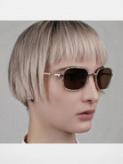 FUTURE UPDATE Hammered Titanium Sunglasses in Yellow - On Female Model