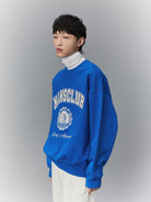 NANS Heavyweight Cotton Varsity Sweatshirt in Blue - On Model