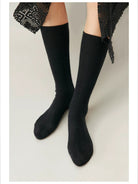 Simple Project Irregular Ribbed Crew Socks in Black - On Model