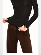 PUKI Lyocell Wide Leg Drawstring Trousers in Brown - On Model