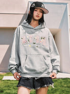MEDM Floral Patch Fleece Hoodie in Gray - On Female Model
