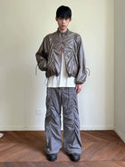 NeverSeez Glossy Ruched Tencel Windbreaker in Coffee - On Male Model