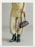 Songmont Mini Leather Bowling Bag in Brown - On Model