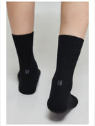 Simple Project Irregular Ribbed Crew Socks in Black - On Model
