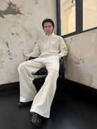 TRIANGLE PROJECT Brushed Cotton Wide Leg Sweatpants in White - On Male Model