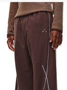 FPA Curved Leg Nylon Trousers in Brown - On Model