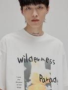 NANS Wilderness Parade Mercerized Tee in Black - On Model