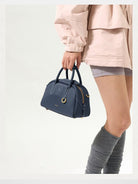 Songmont Leather Mini Bowling Bag in Navy Blue - On Model