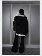 RARELY ALIKE Flared Cotton Denim Jeans in Black - On Model