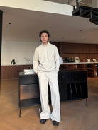 TRIANGLE PROJECT Brushed Cotton Wide Leg Sweatpants in White - On Male Model