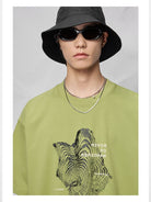 NANS 300g Cotton Graphic T Shirt in Green - On Model