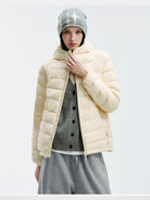 MEDM Waterproof Goose Down Hooded Puffer in White - On Female Model