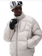 FPA Stand Collar Goose Down Puffer in White - On Male Model