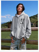 MEDM Camellia Embroidered Zip Hoodie in Gray - On Male Model