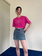 NeverSeez Embossed Script Cotton T Shirt in Hot Pink - On Female Model