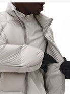 FPA Stand Collar Goose Down Puffer in White - On Male Model