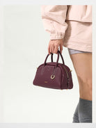 Songmont Leather Mini Bowling Bag in Burgundy - On Model
