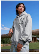 MEDM Camellia Embroidered Zip Hoodie in Gray - On Male Model