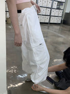 NeverSeez Accordion Pocket Wide Leg Cargo Pants in Black