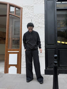 TRIANGLE PROJECT Brushed Cotton Wide Leg Sweatpants in Black - On Male Model